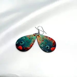Floral patterned earrings on white background